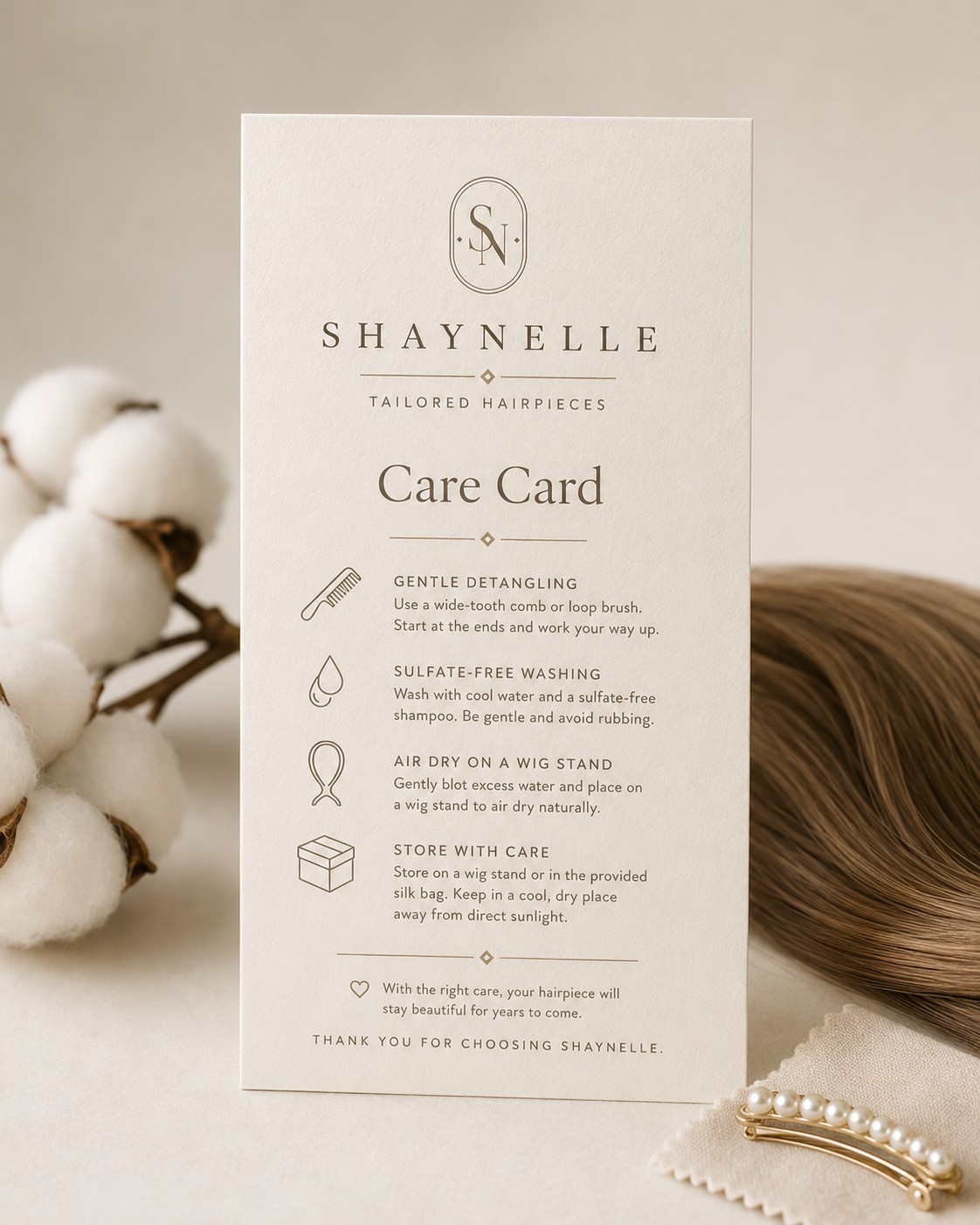 Shaynelle printed care card with icons for detangling, washing, drying, and storage